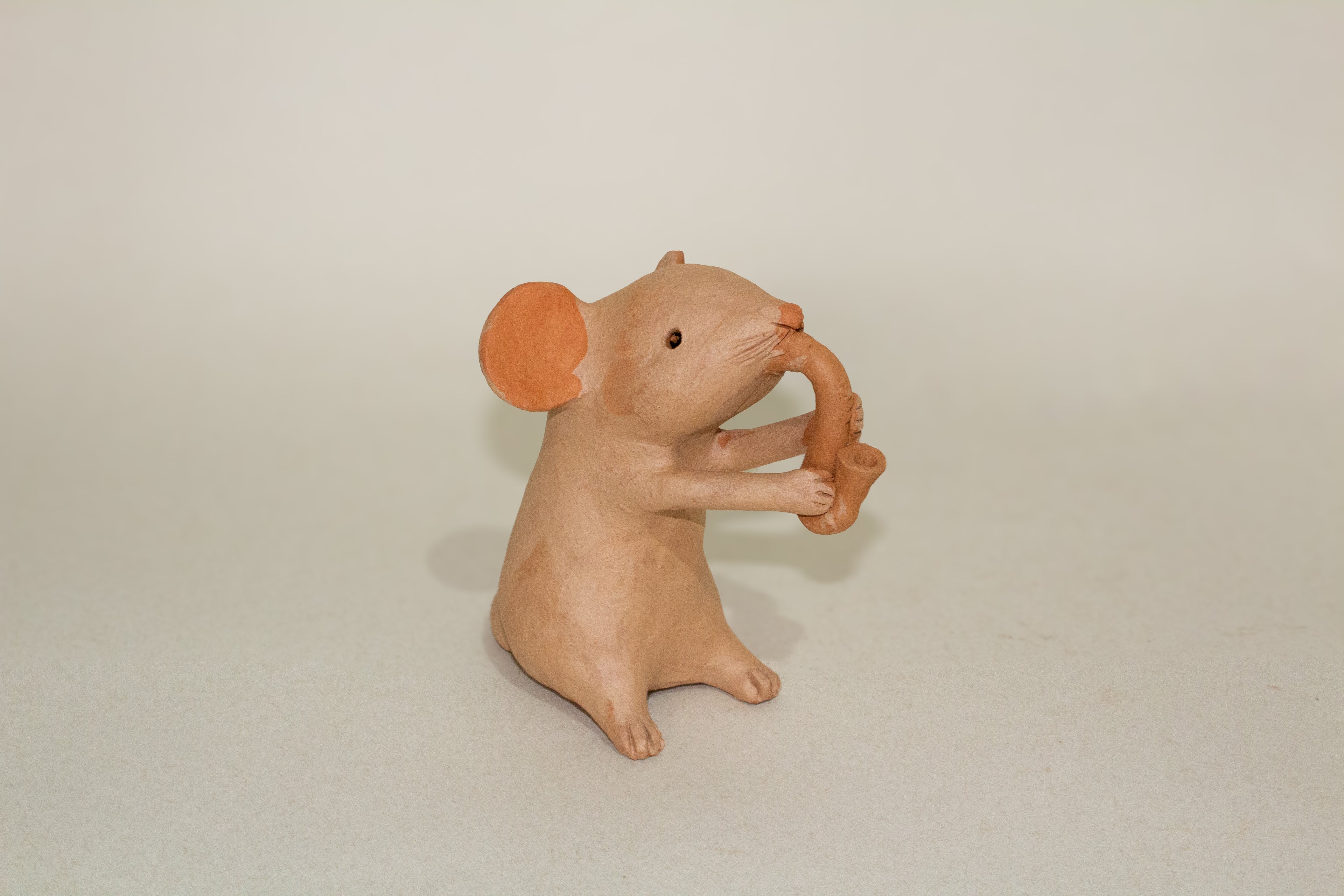 Juego de ratones músicos de barro naranja l