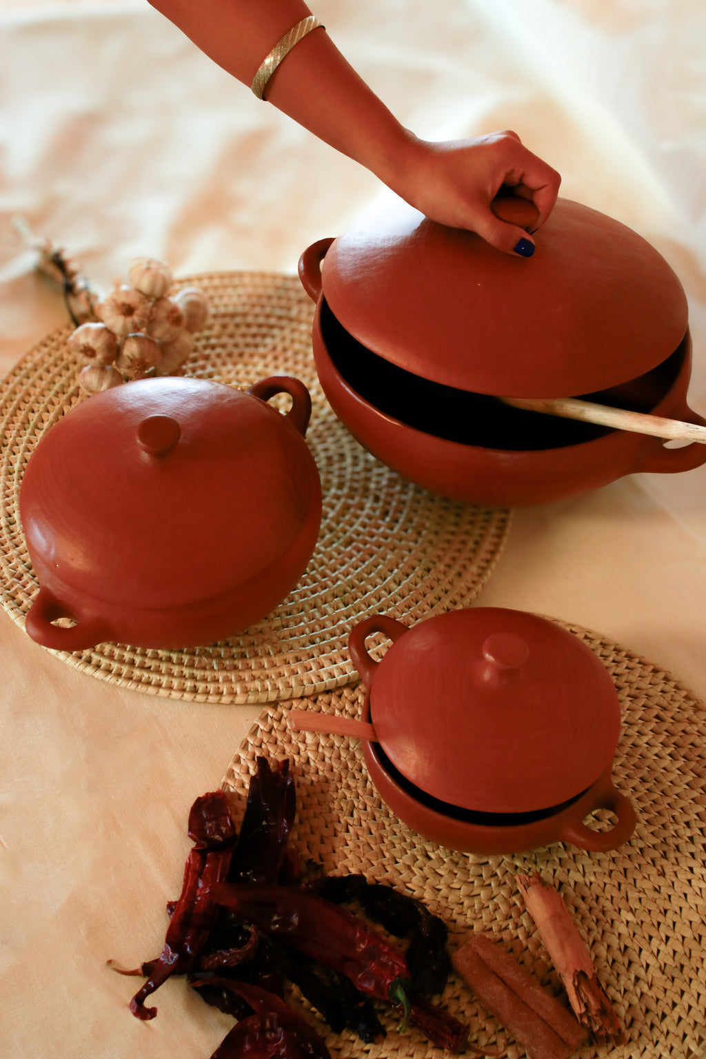 Juego de cazuelas de barro rojo