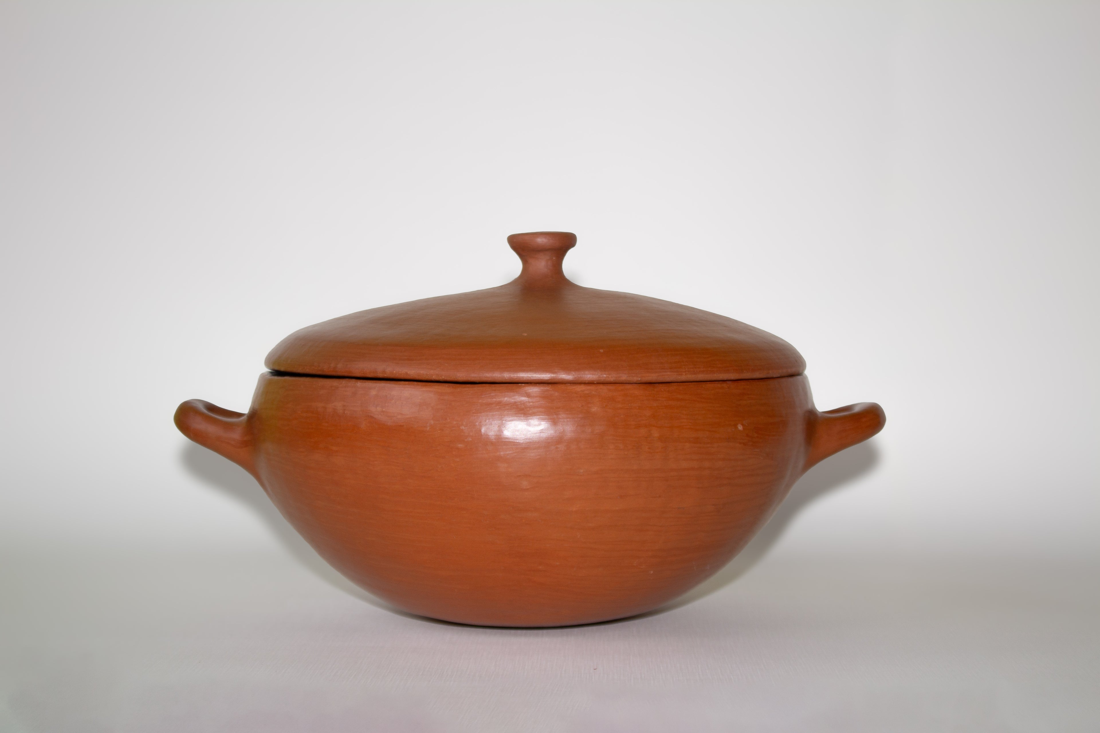 Juego de cazuelas de barro rojo