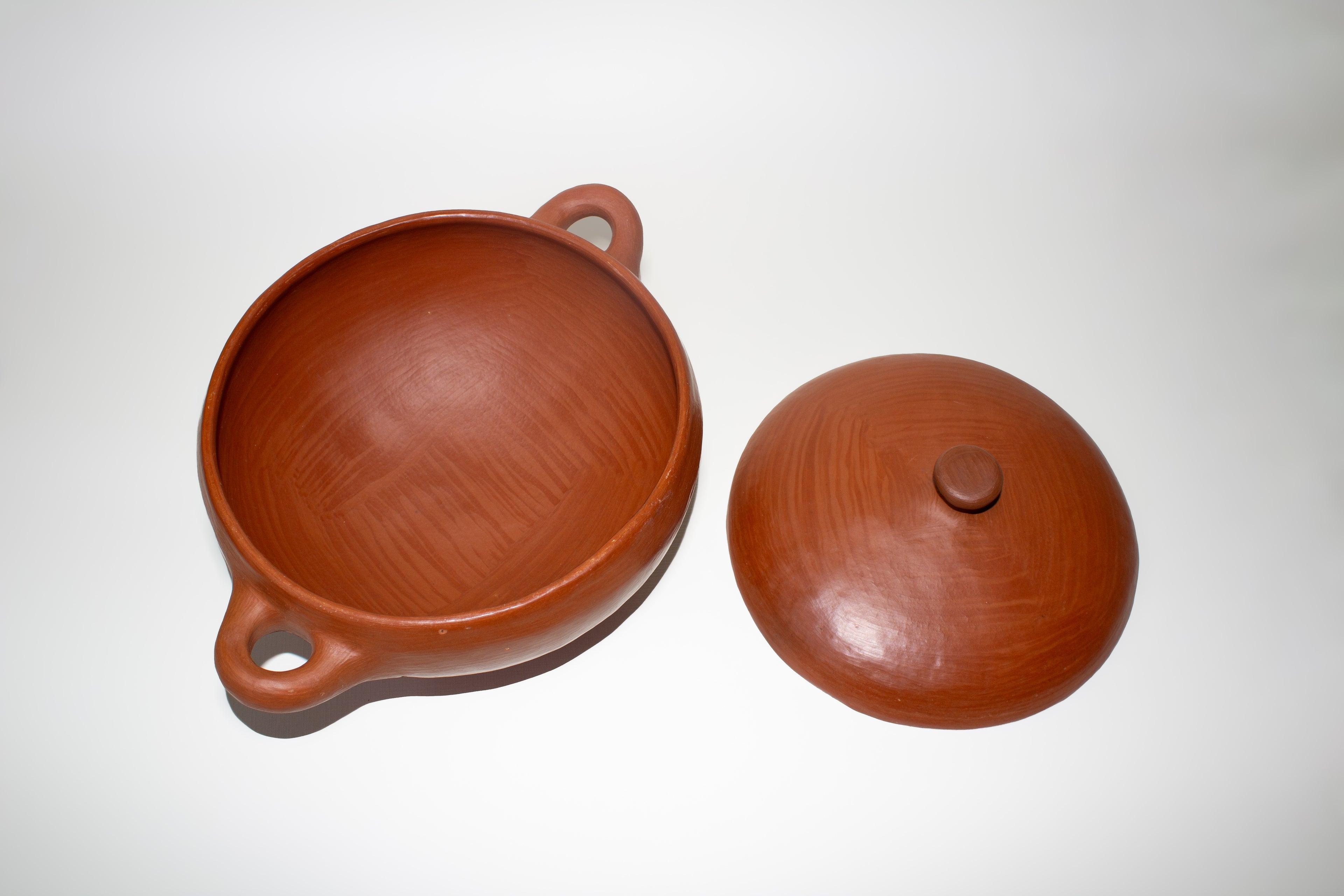 Juego de cazuelas de barro rojo