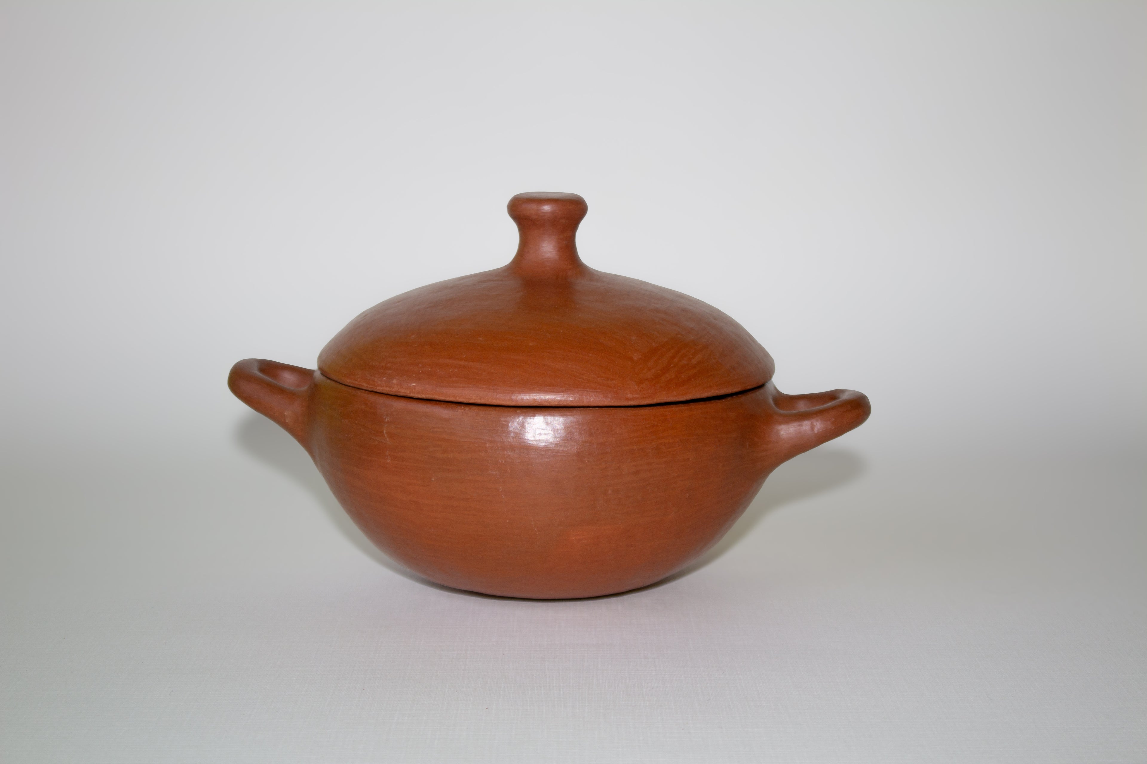Juego de cazuelas de barro rojo