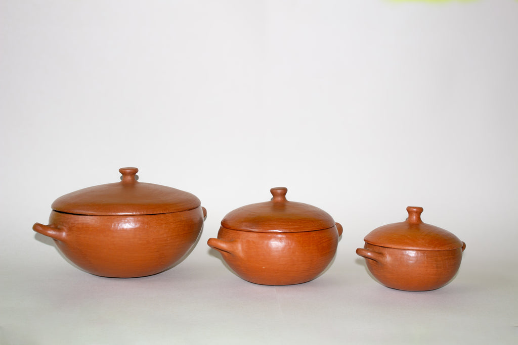 Juego de cazuelas de barro rojo