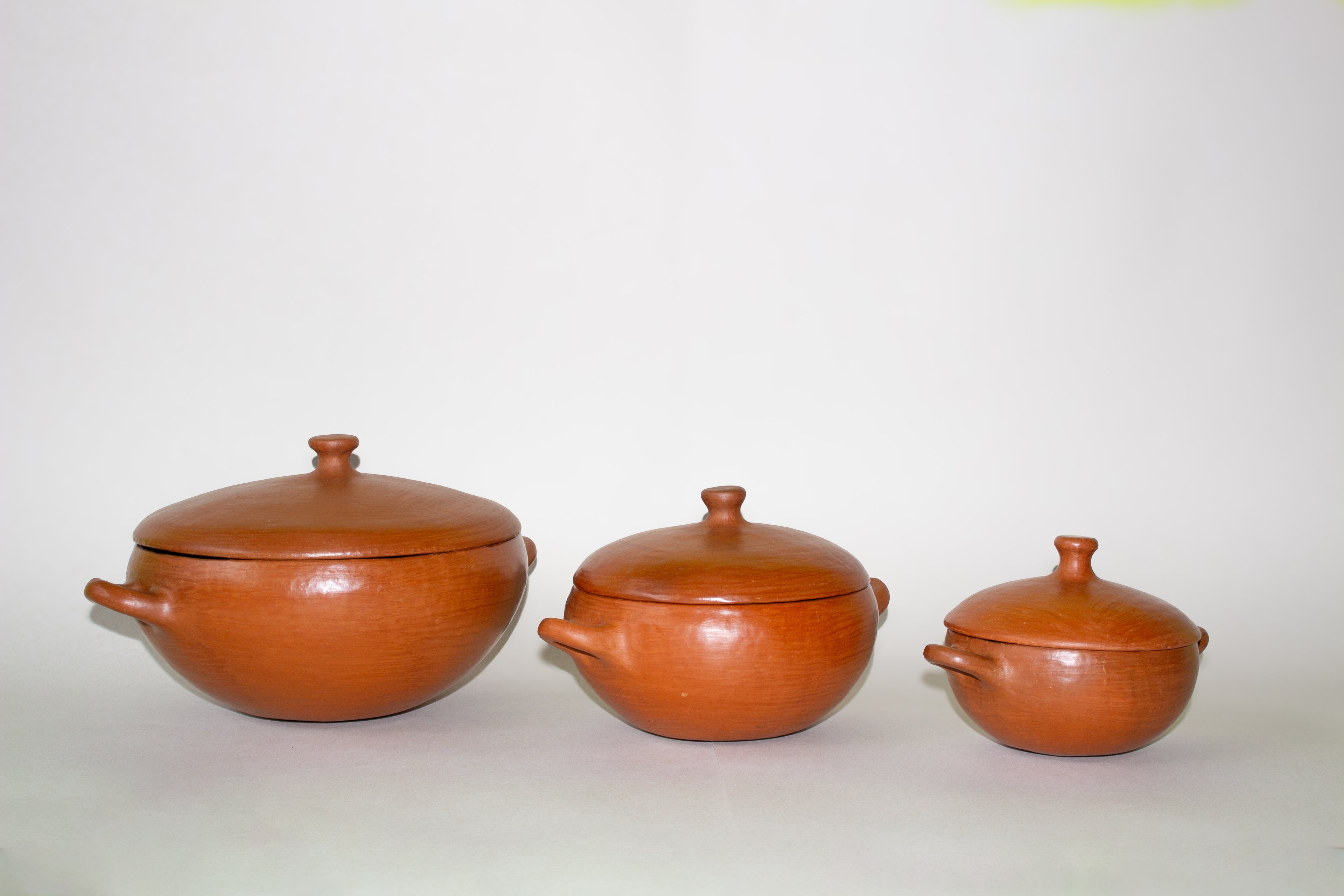Juego de cazuelas de barro rojo