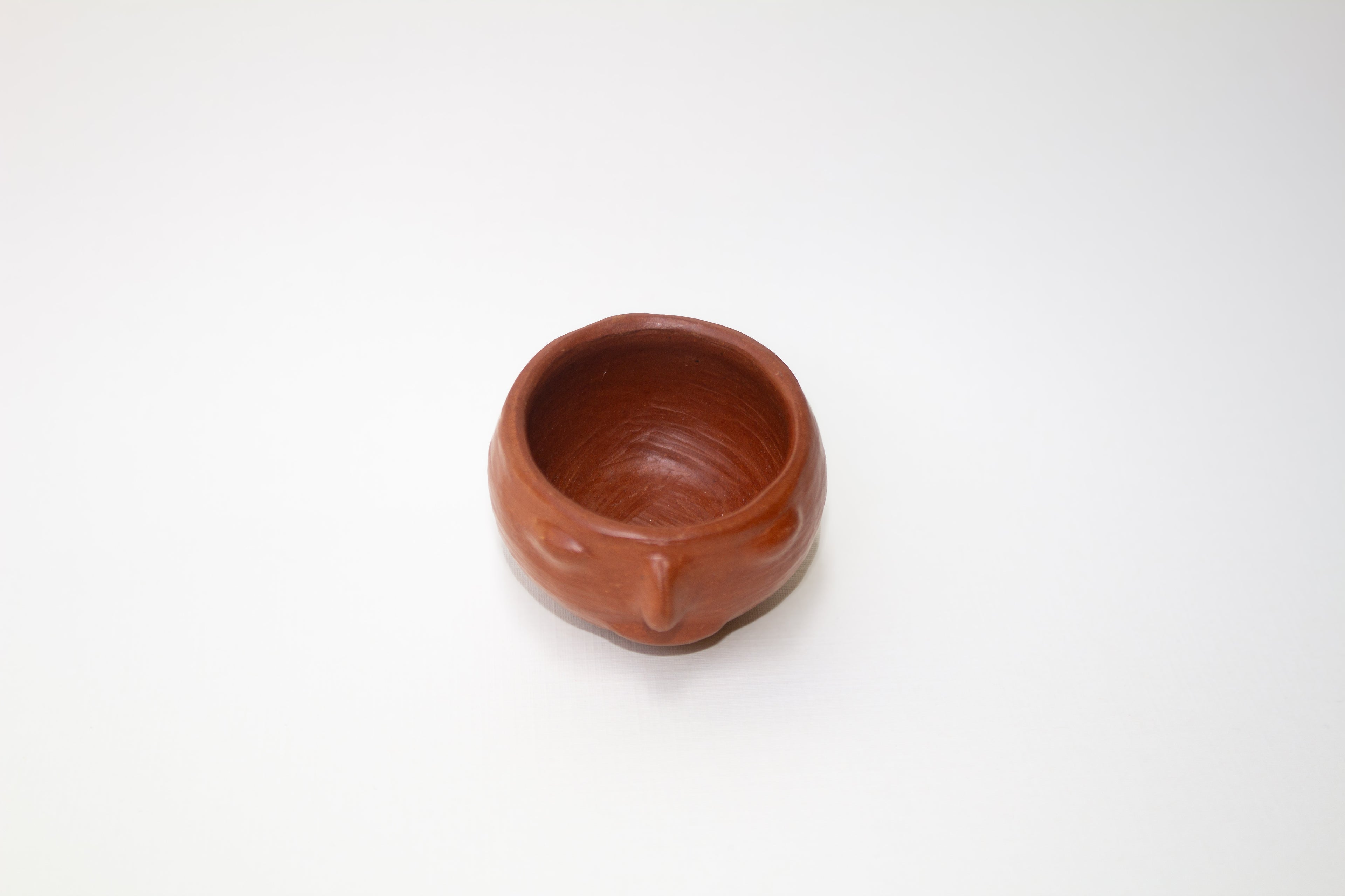 Juego de mezcalero con cara de barro rojo