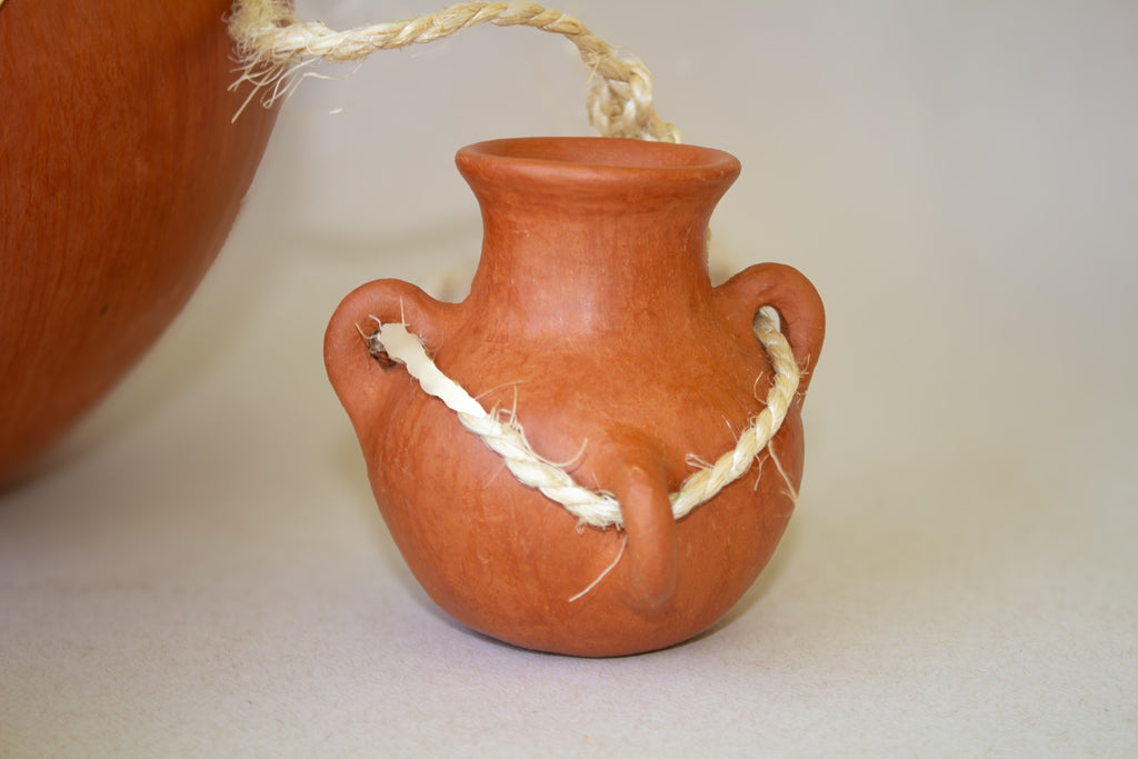 Juego de cántaros colgantes de barro naranja