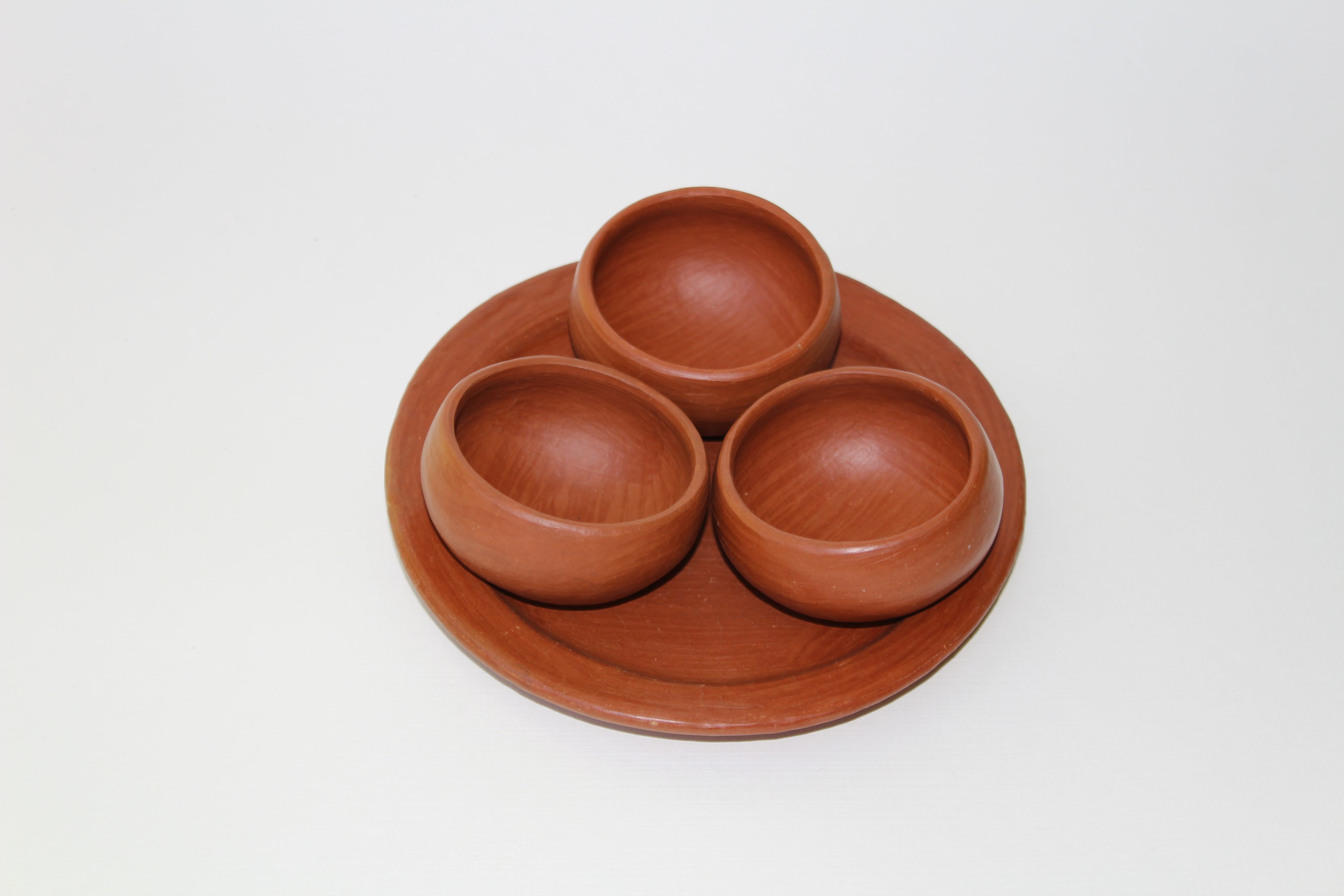 Juego de mezcaleros redondos de barro rojo