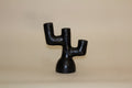 Candelabro de barro negro