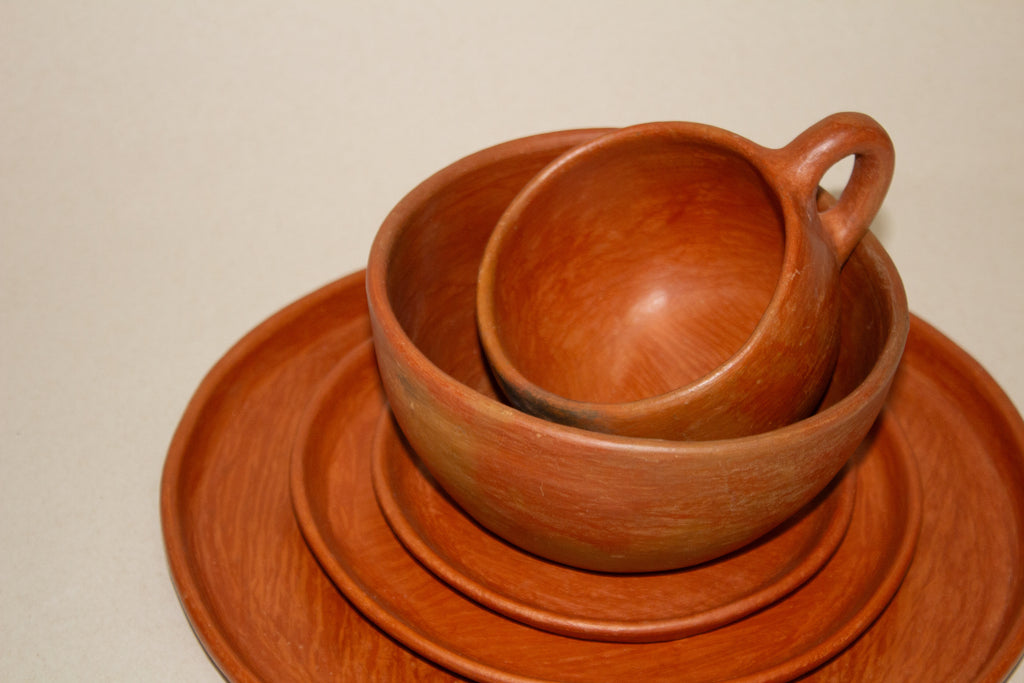 Juego de vajilla de barro naranja