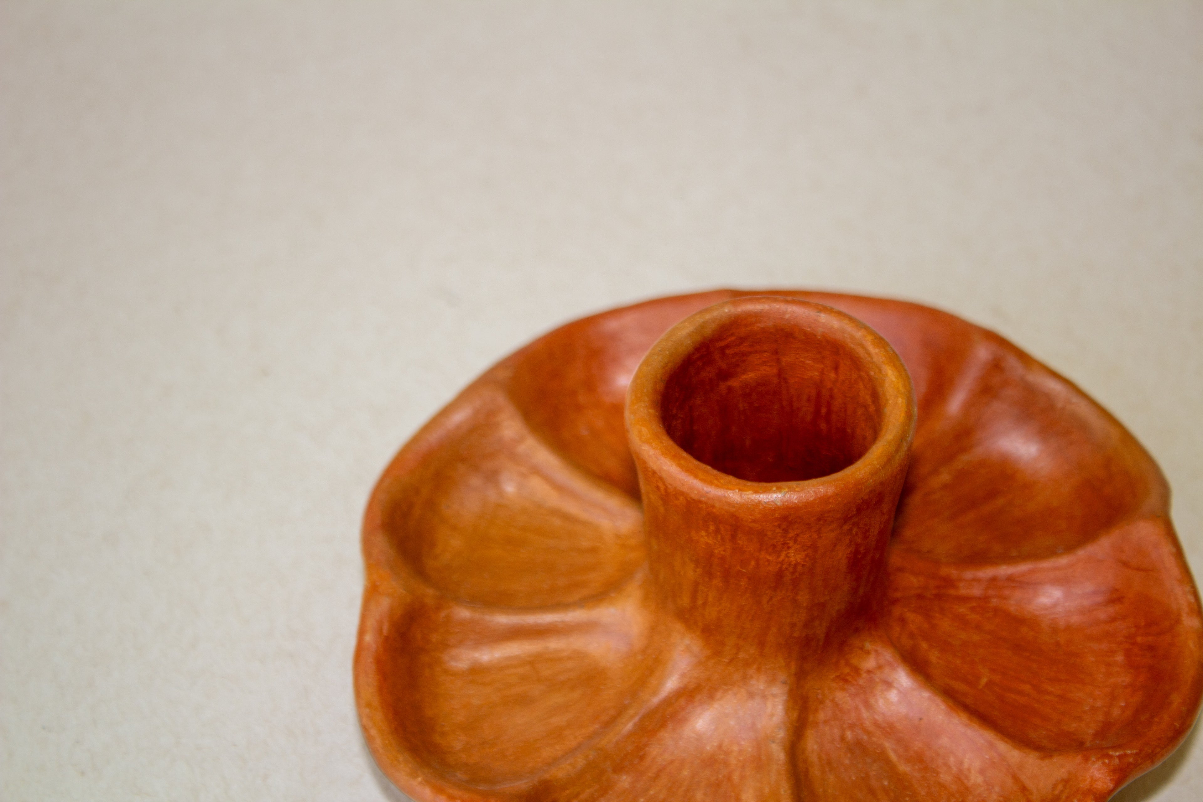 Candelabro flor barro naranja