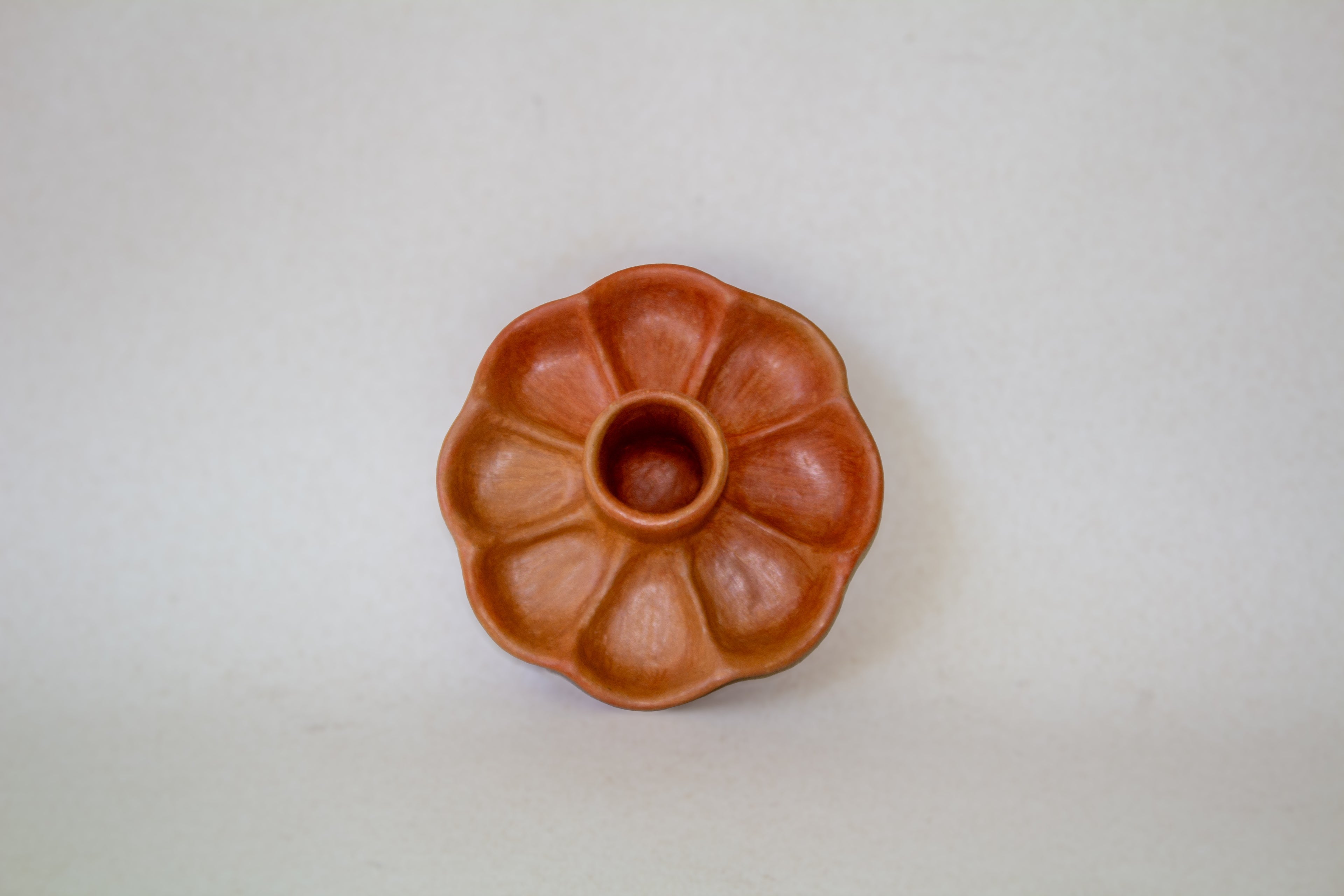 Candelabro flor barro naranja
