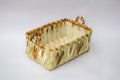 Cesto rectangular con agarraderas de carrizo decorado